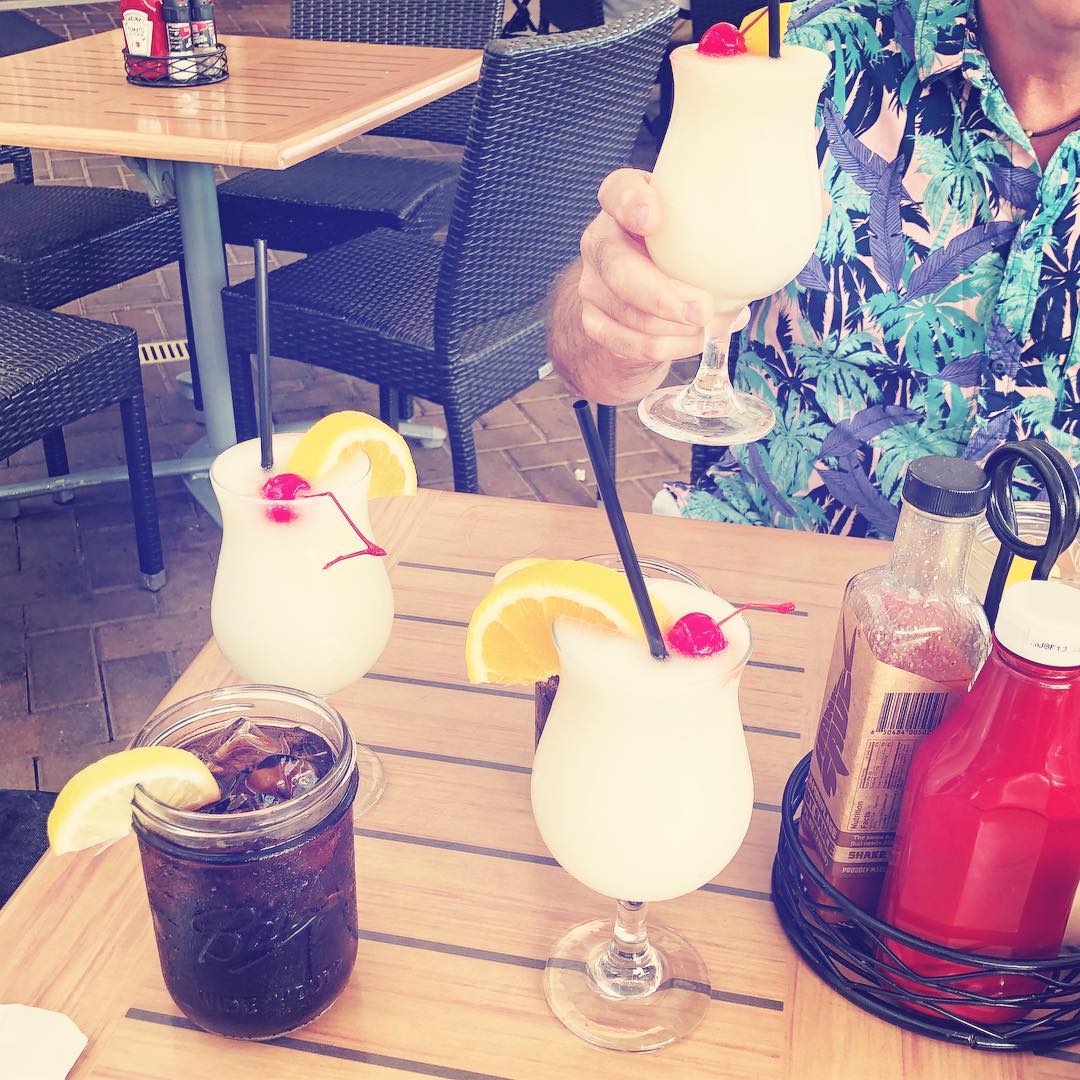 Piña coladas on patio table