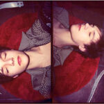 male living on small round red rug