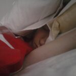 me sleeping with red ikea sheets