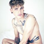 tattoo guy in red diesel underwear