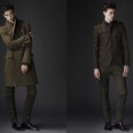 Stylish male model in Burberry Prorsum tailored military suits.