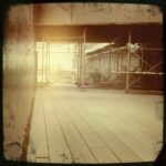 Scenic view of a scaffolded walkway in a construction area.