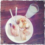 Delicious dinner of roasted chicken, vegetables, and lemonade.