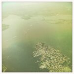 Aerial view of NJ Bay with boats and marina.