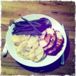 Delicious turkey dinner with green beans and creamy potatoes.