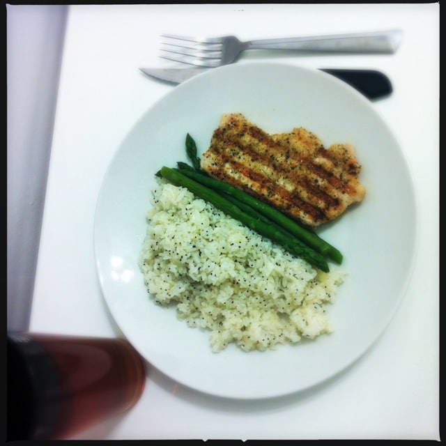Seasoned Porkchop, asparagus, butter-garlic and poppy rice.