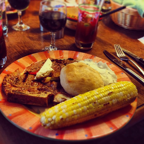 T-bone steak, corn, mashed potatoes