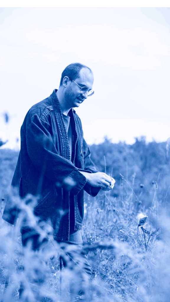 zachary martz picking milkweed pods