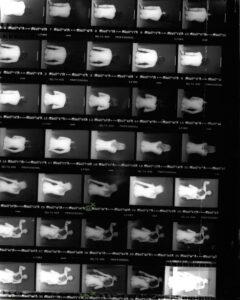 contact sheet shelf drink man ray