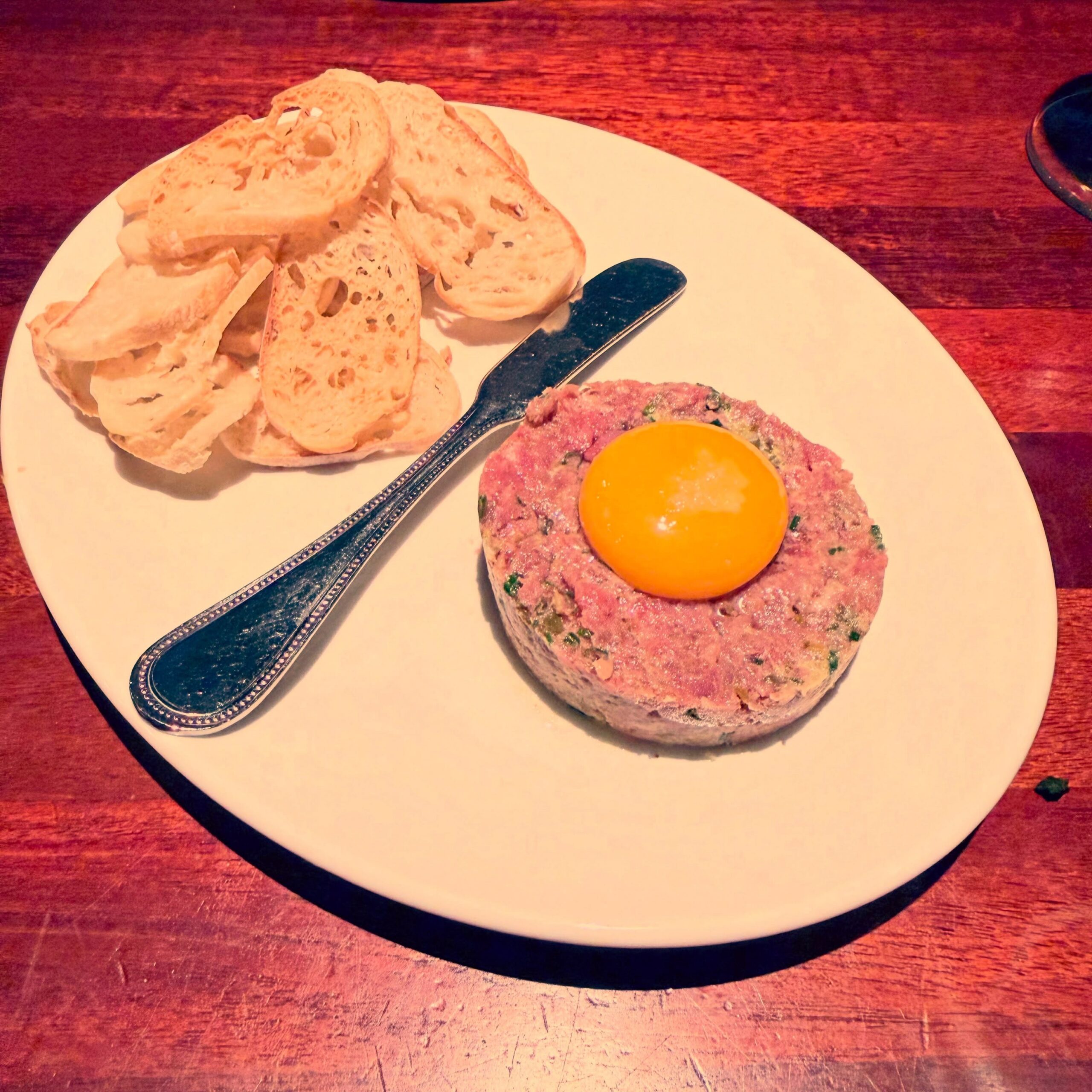 Classic Beef Tartare with Raw Egg Yolk & Crostini
